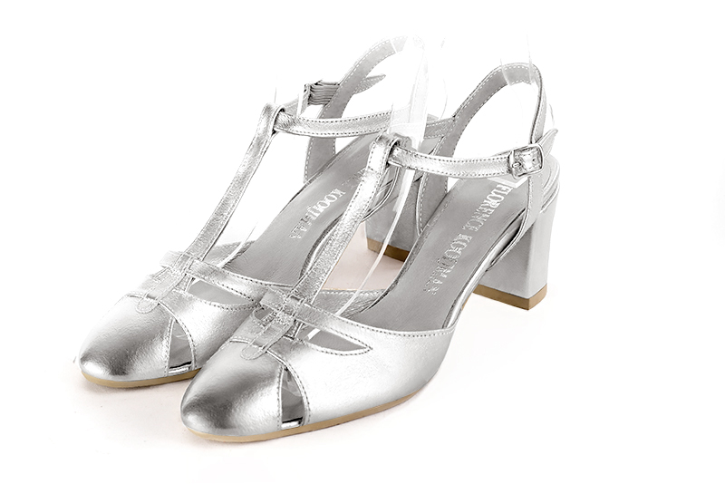 Light silver women's open back T-strap shoes. Round toe. Medium block heels. Front view - Florence KOOIJMAN